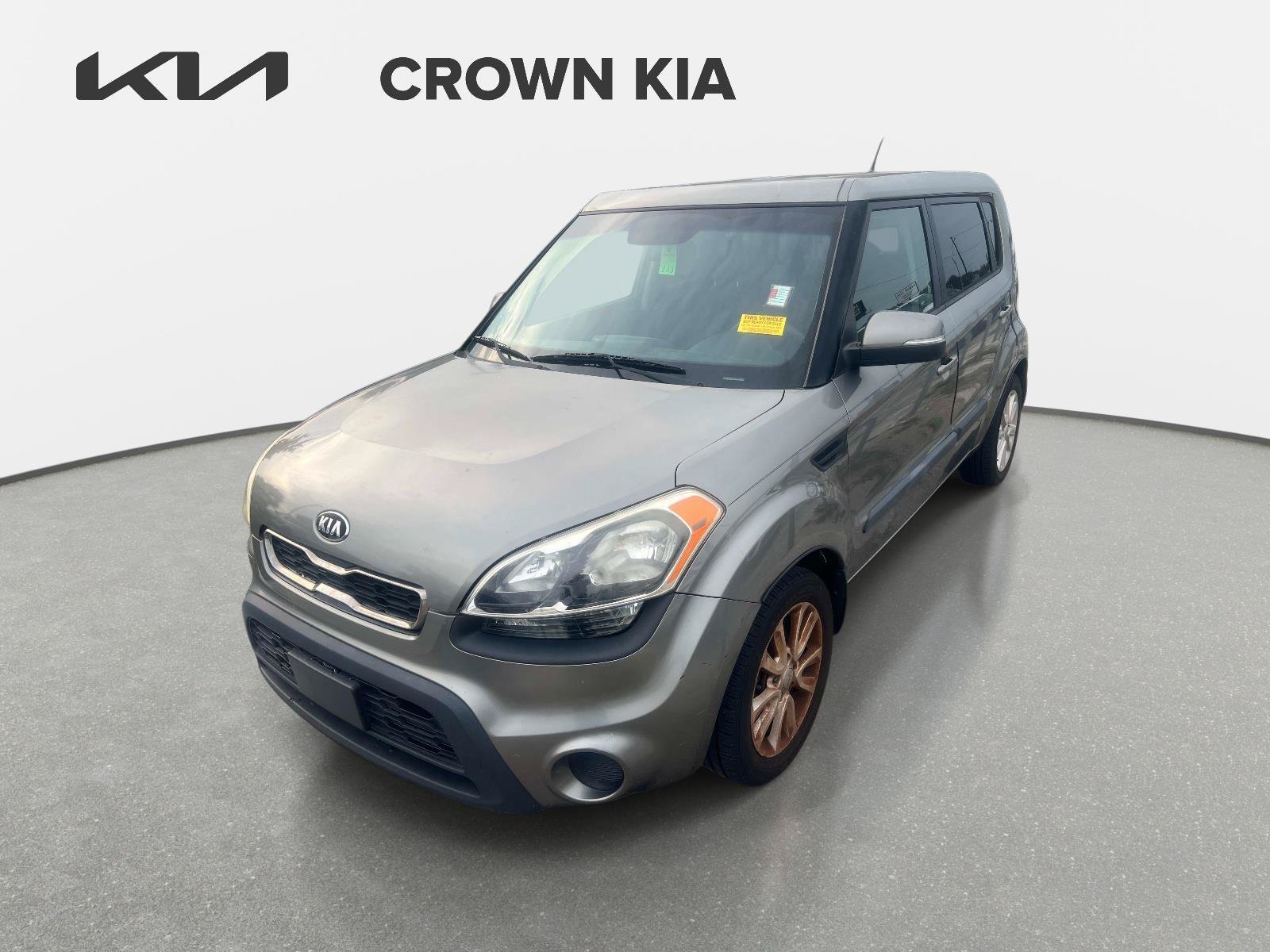 Used 2013 Titanium Pearl Metallic Kia + image 1
