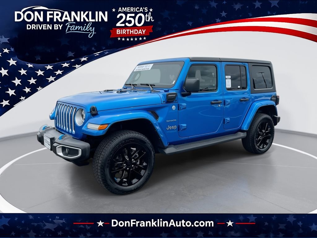 Used 2022 Blue Jeep Unlimited Sahara 4xe image 1