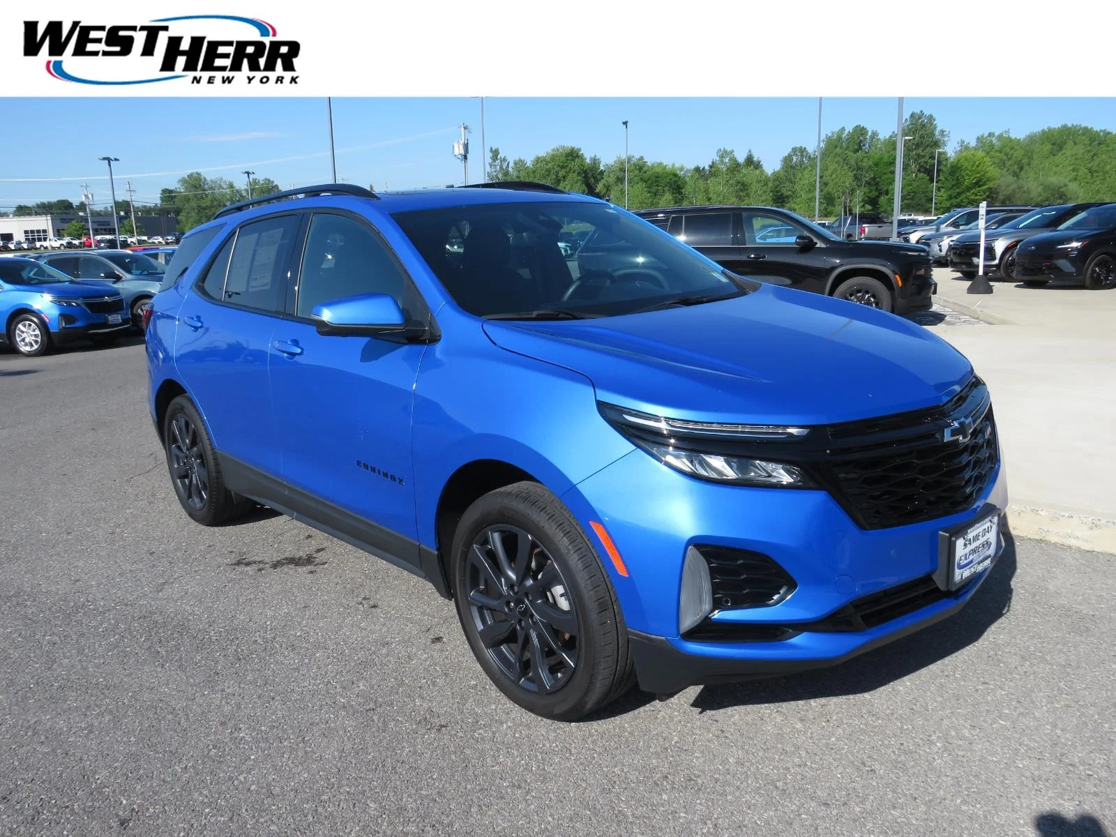 Used 2024 Riptide Blue Metallic Chevrolet RS image 1
