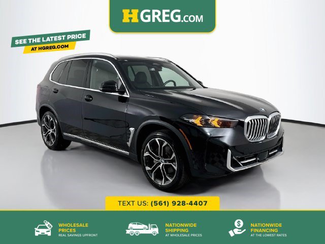 Used 2024 Black Sapphire Metallic BMW sDrive40i image 1