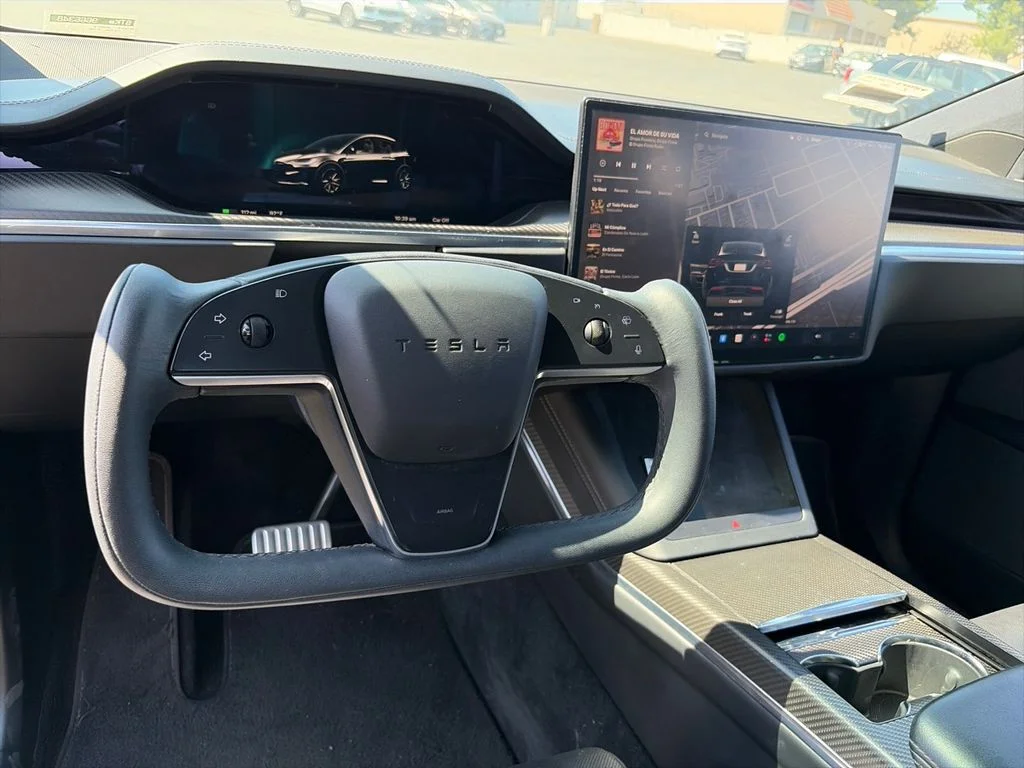 Used 2023 Solid Black Tesla Plaid image 11