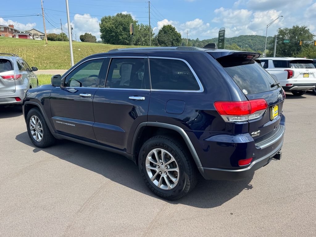 Used 2015 Blue Jeep Limited image 4