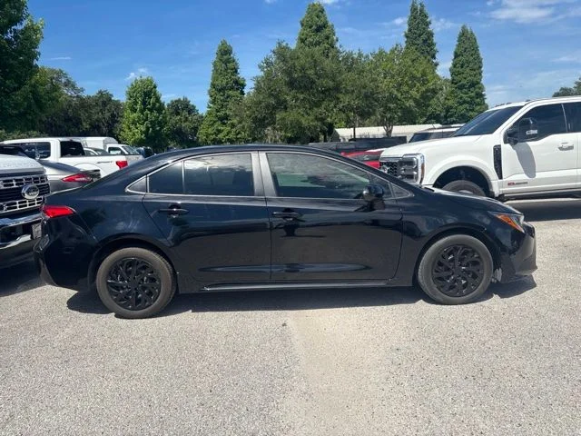Used 2024 Black Toyota LE image 4