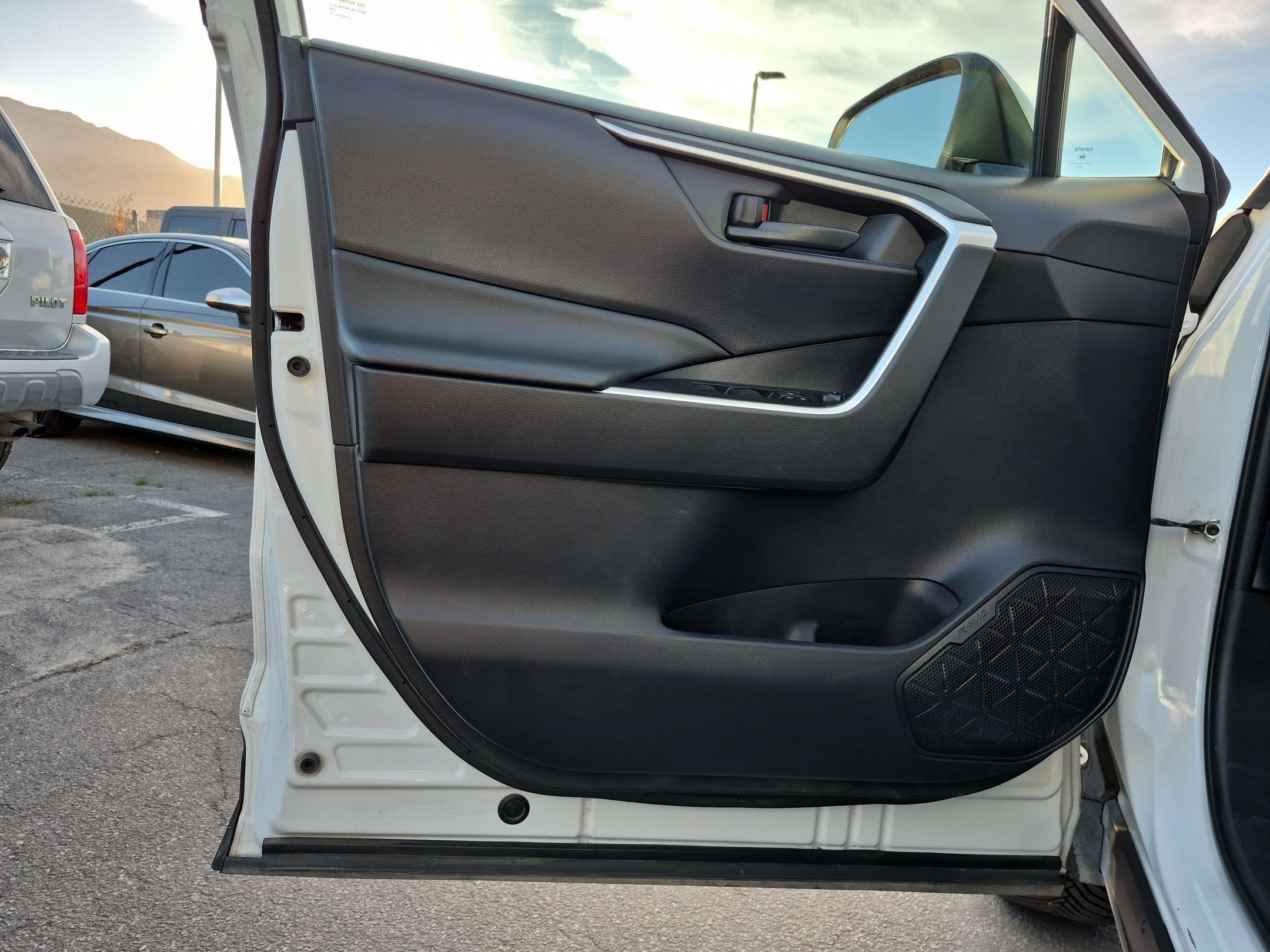 Used 2019 Super White Toyota Hybrid LE image 12