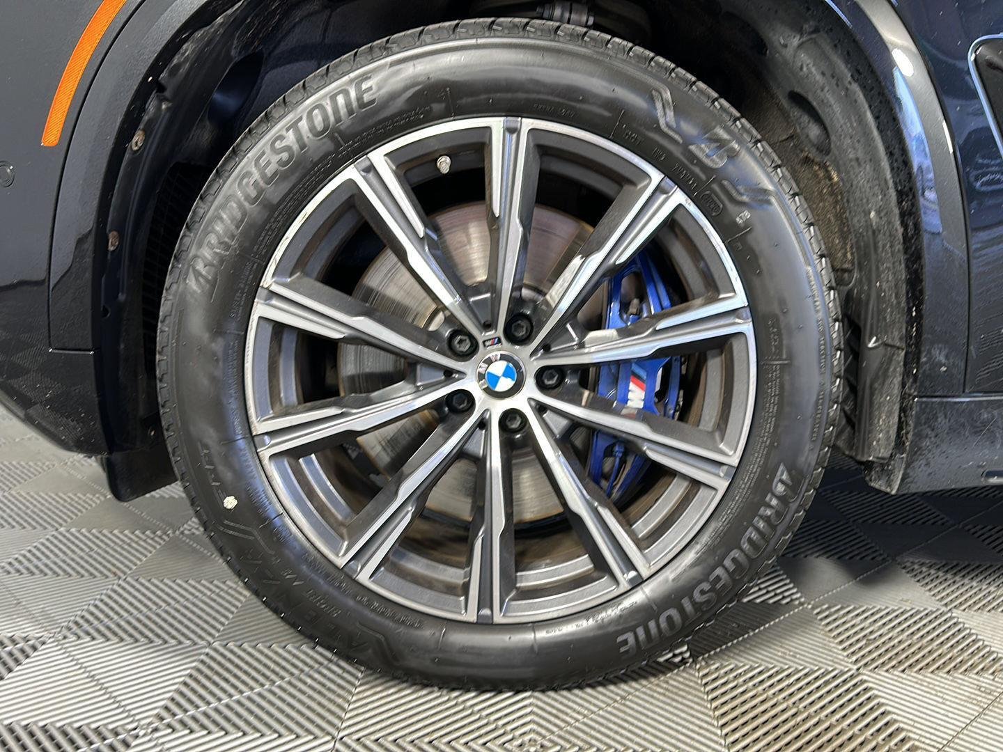 Certified Used 2024 Black Sapphire Metallic BMW M60i image 9