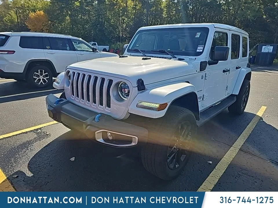 Used 2023 White Jeep Sahara 4xe image 1