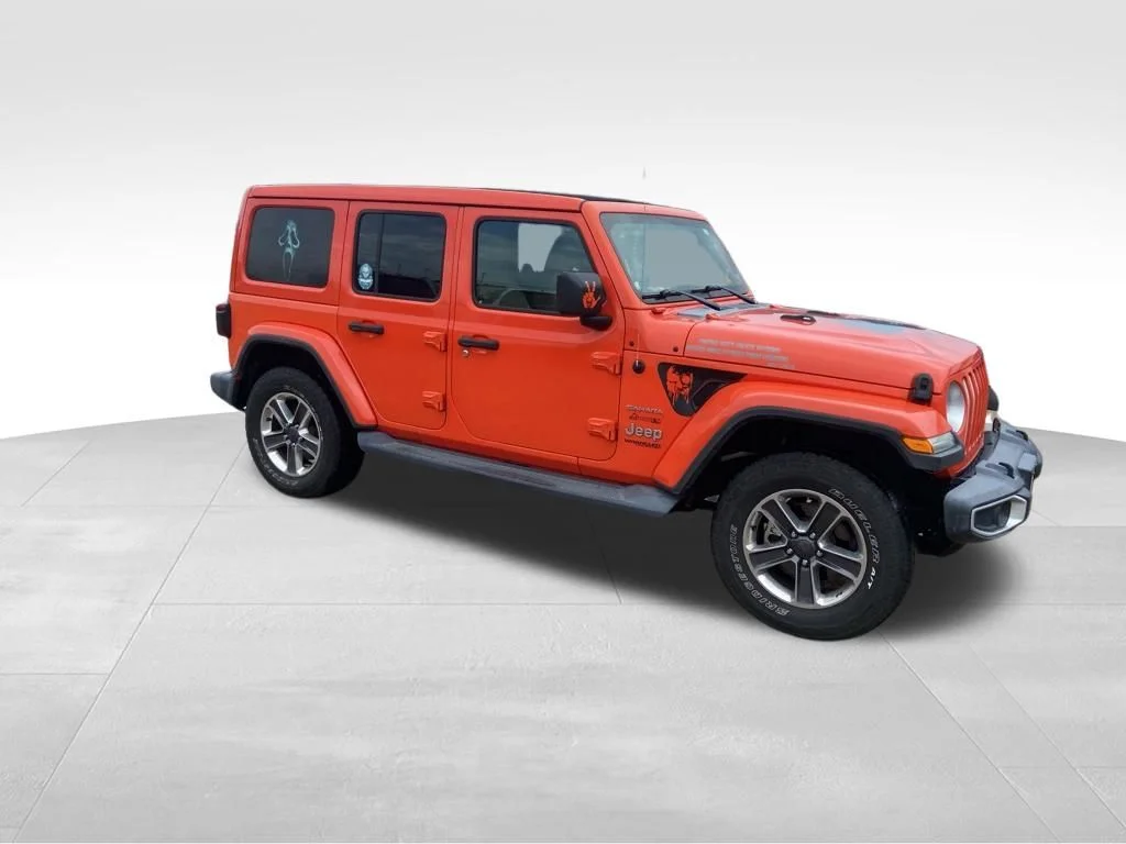 Used 2019 Orange Jeep Unlimited Sahara image 9