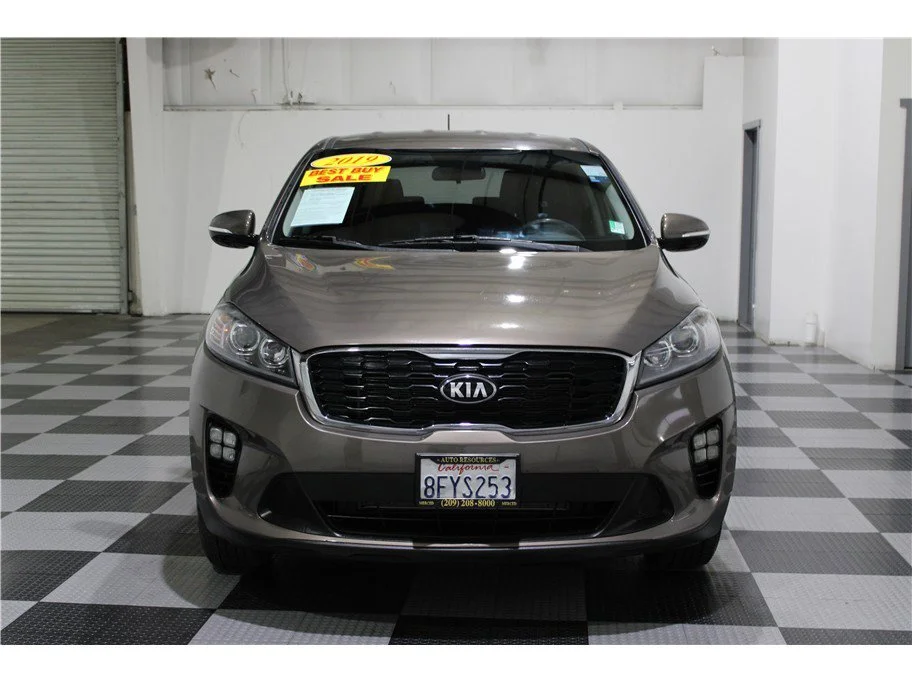 Used 2019 Dragon Brown Kia LX image 2