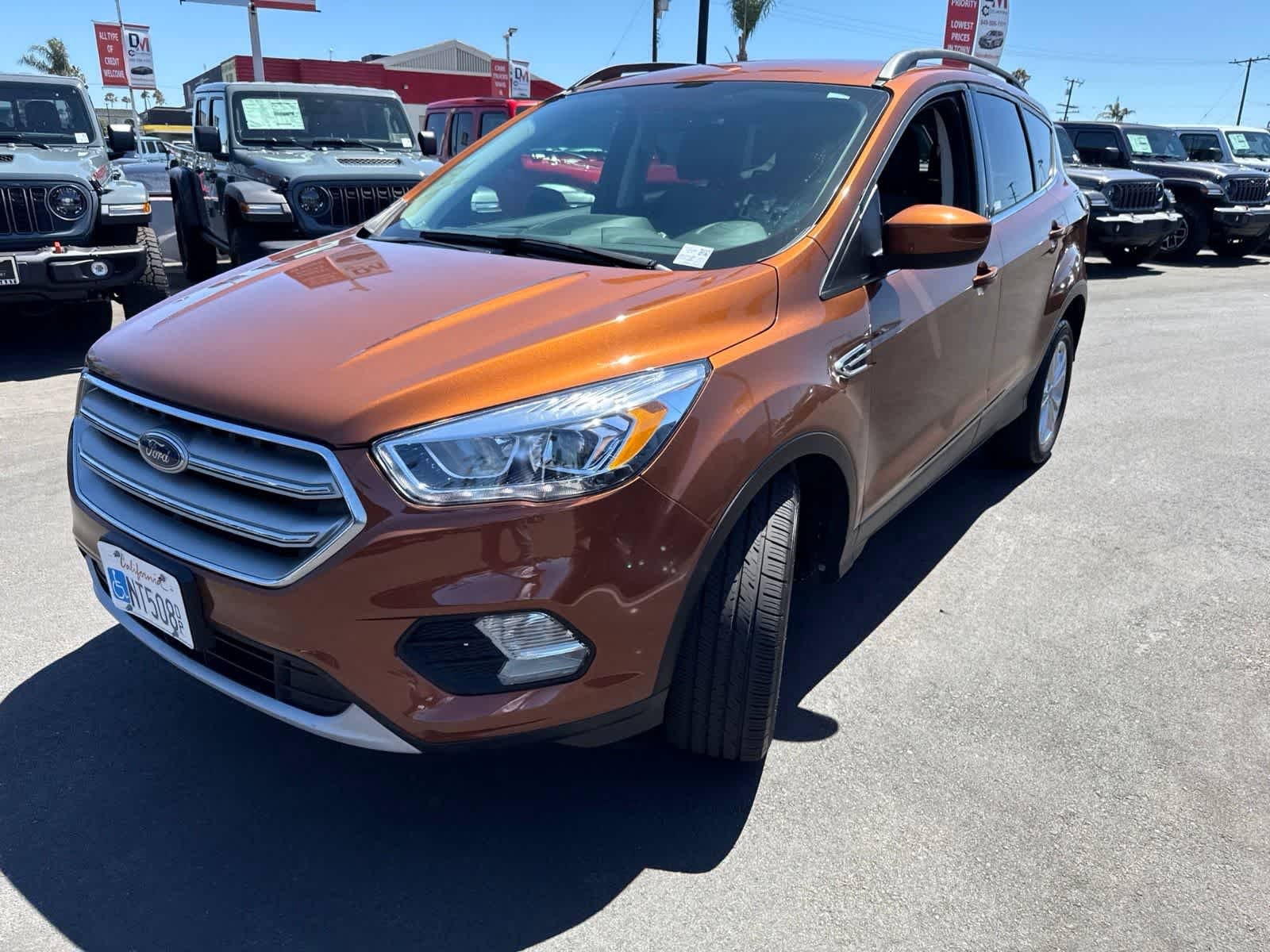 Used 2017 Ford Escape SE with VIN 1FMCU0GD6HUA32476 for sale in Costa Mesa, CA