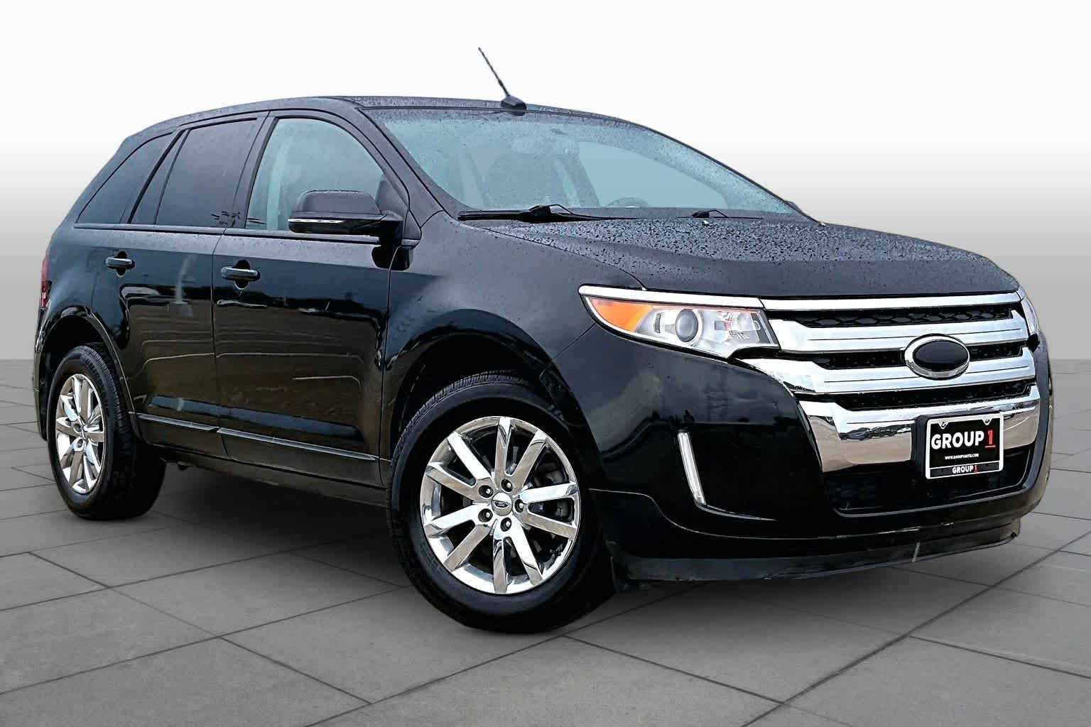 Used 2013 Tuxedo Black Metallic Ford SEL image 2