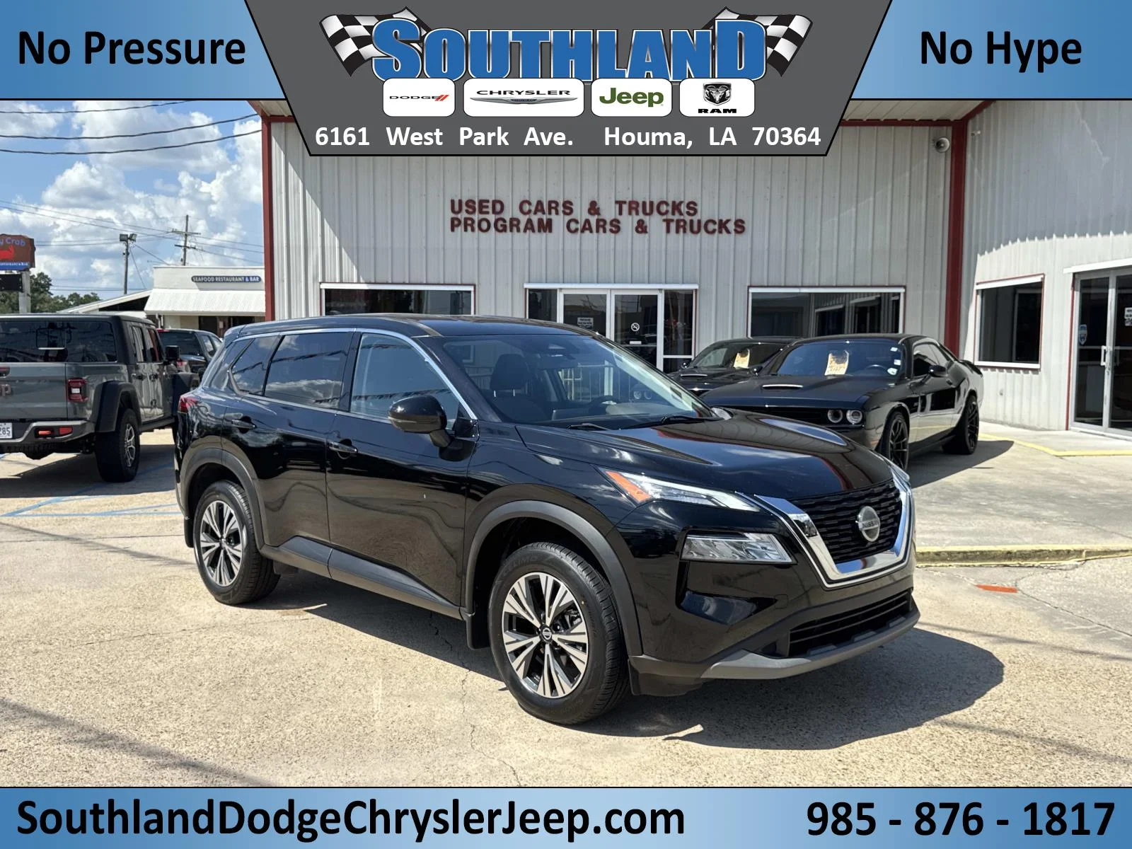 Used 2021 Super Black Nissan SV image 1