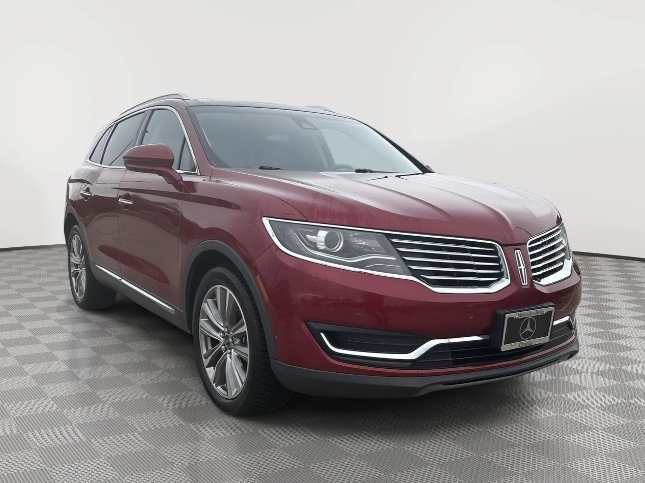 Used 2016 Ruby Red Metallic Tinted Clearcoat Lincoln Reserve image 1