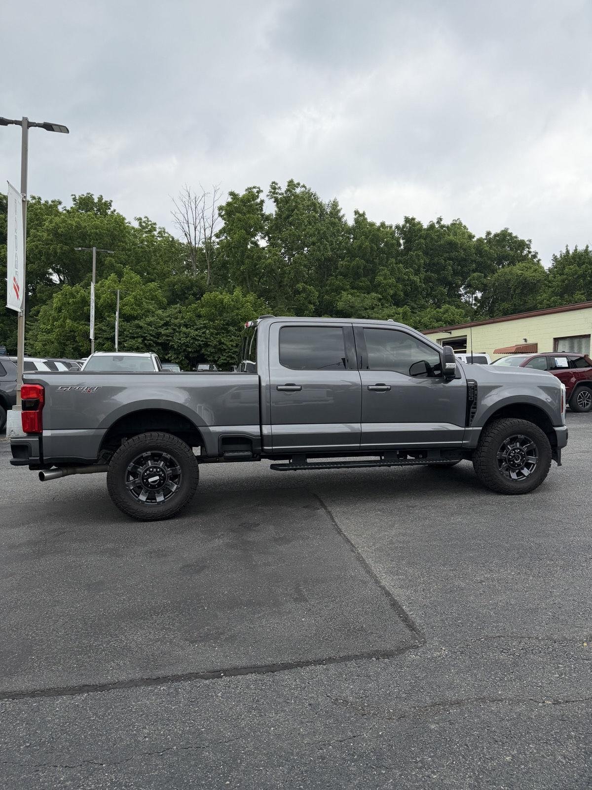 Used 2024 Carbonized Gray Metallic Ford LARIAT image 2