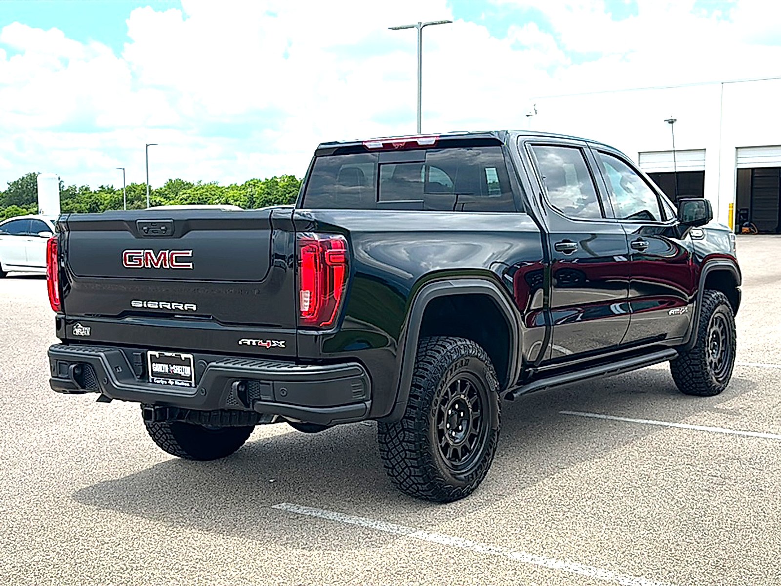 Used 2026 Onyx Black GMC Crew Cab, Short Bed, AT4X, 4WD image 8