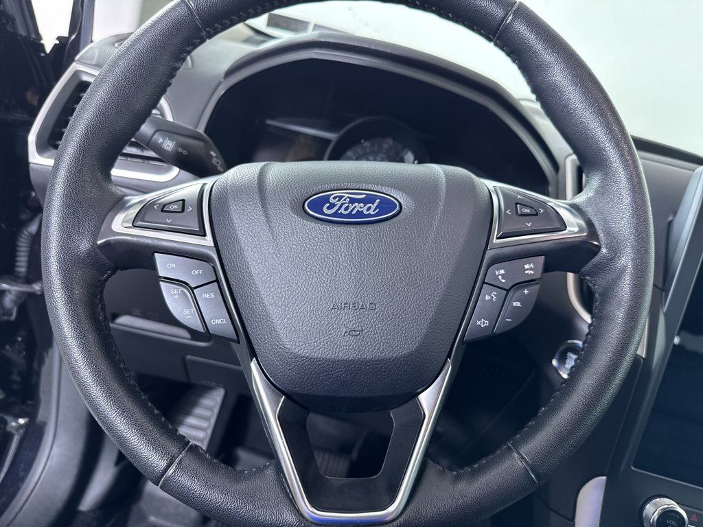 Used 2024 Agate Black Metallic Ford SEL image 21