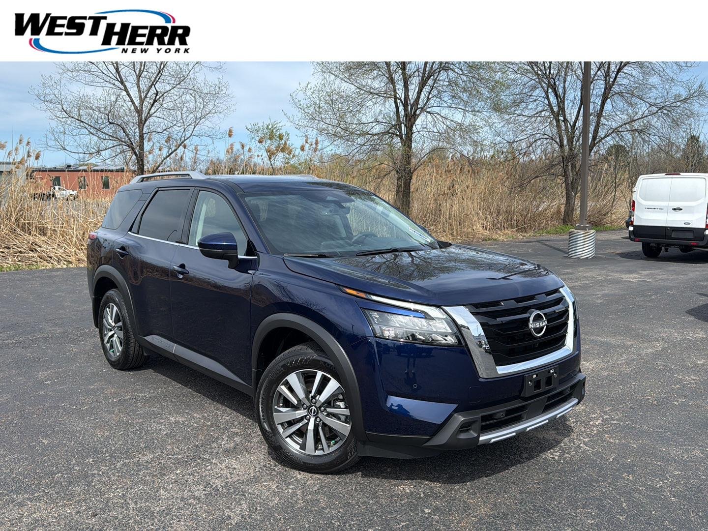 Used 2025 Deep Ocean Blue Pearl Nissan SL image 1