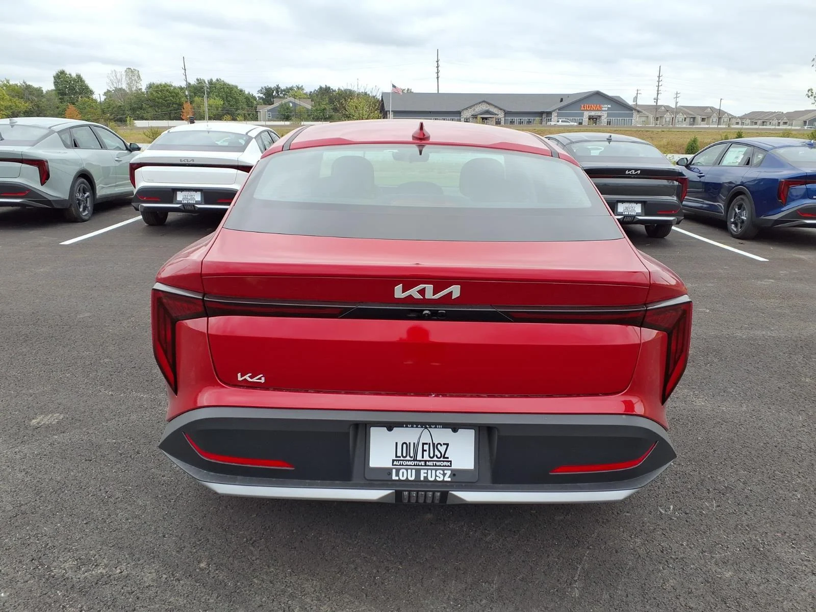 New 2026 Currant Red Kia LXS image 14