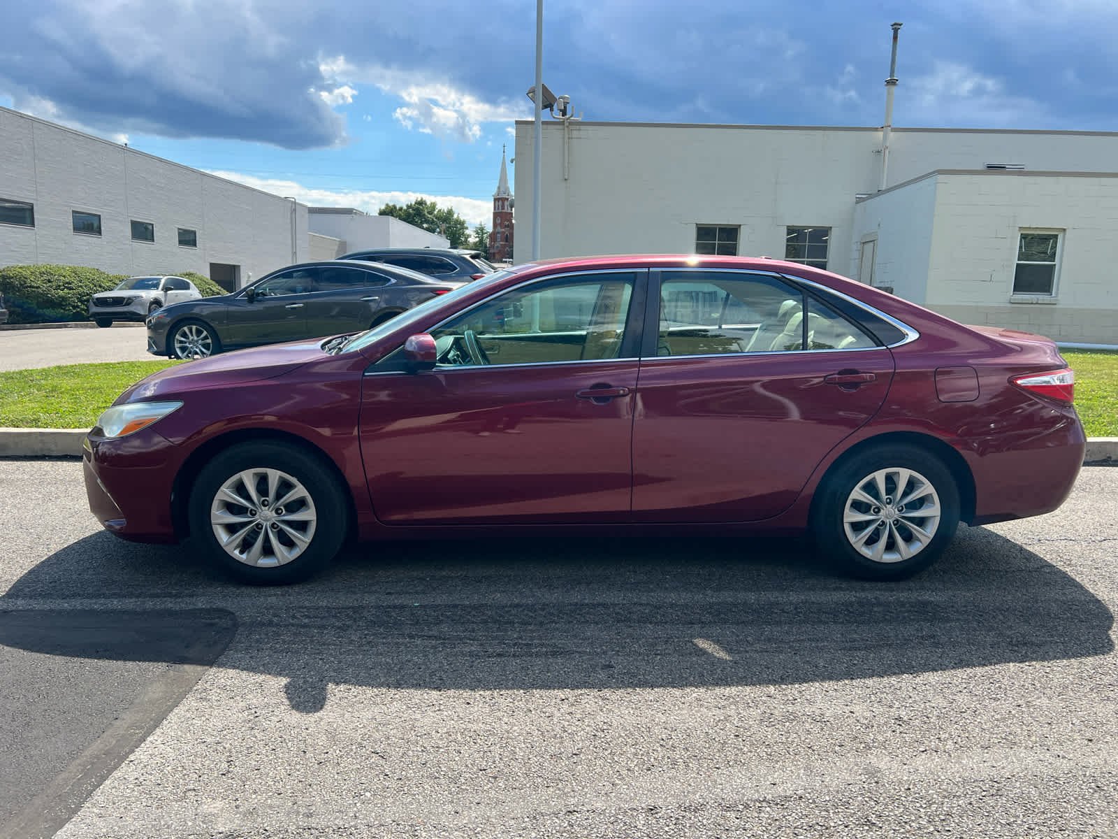 Used 2015 Ruby Flare Pearl Toyota LE image 2