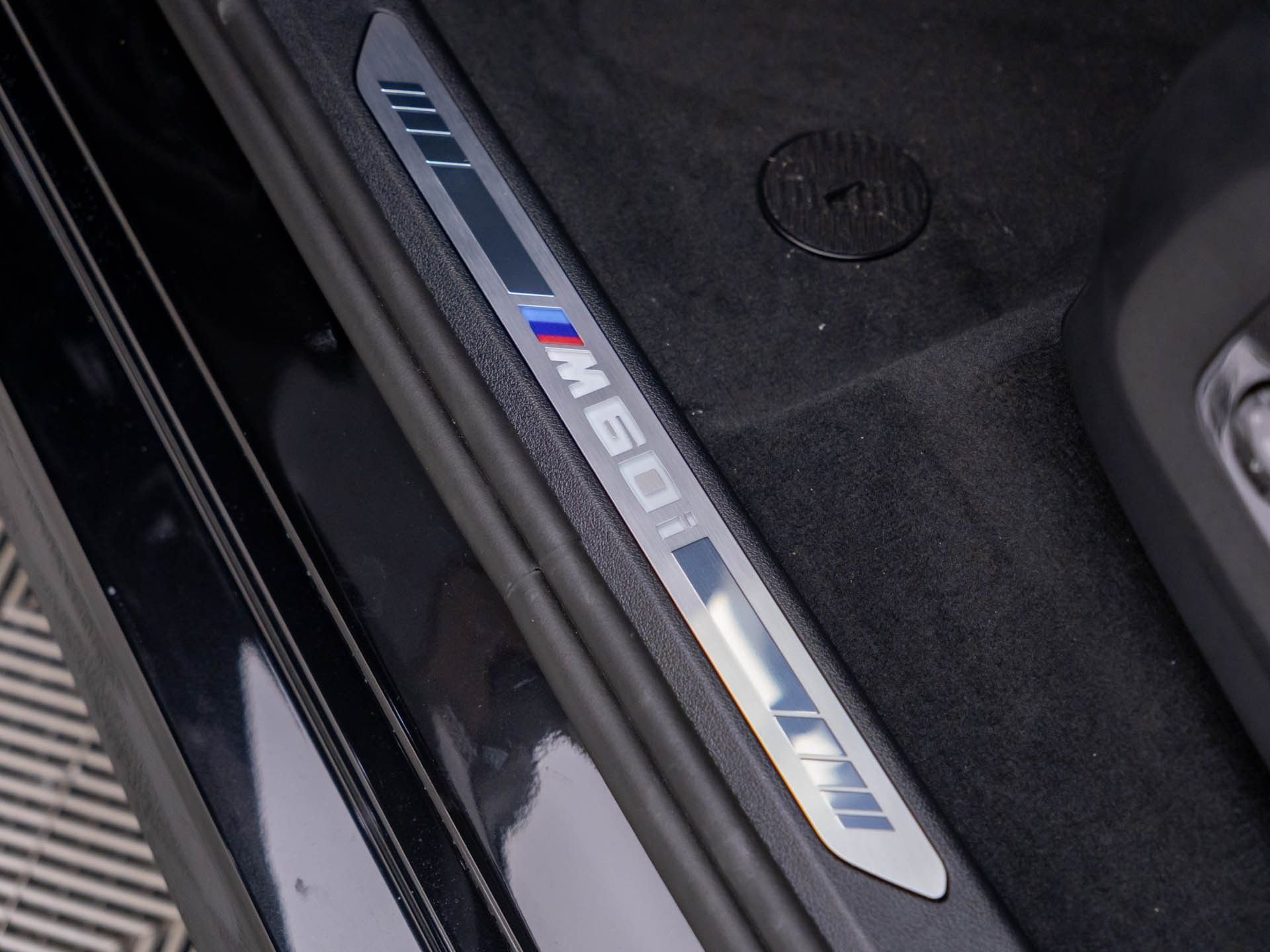New 2027 Black Sapphire Metallic BMW M60i image 15