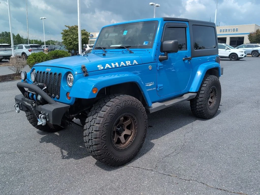 Used 2011 Blue Jeep Sahara image 1