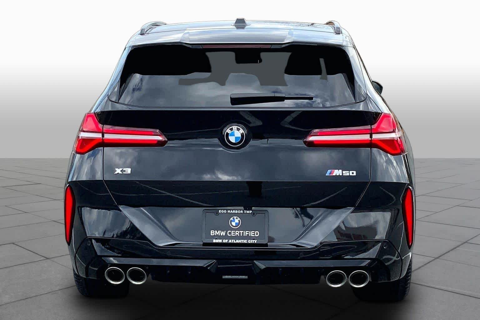Certified Used 2025 Black Sapphire Metallic BMW M50 xDrive image 4