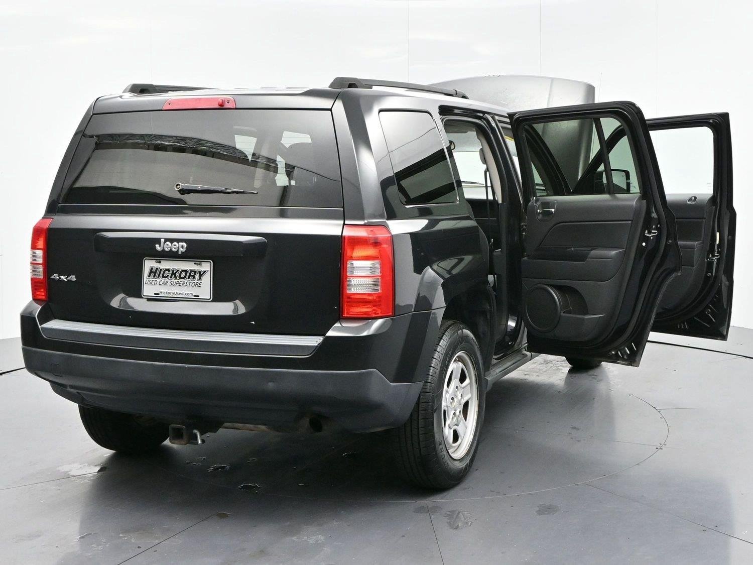 Used 2011 Brilliant Black Crystal Pearl Jeep Sport image 33