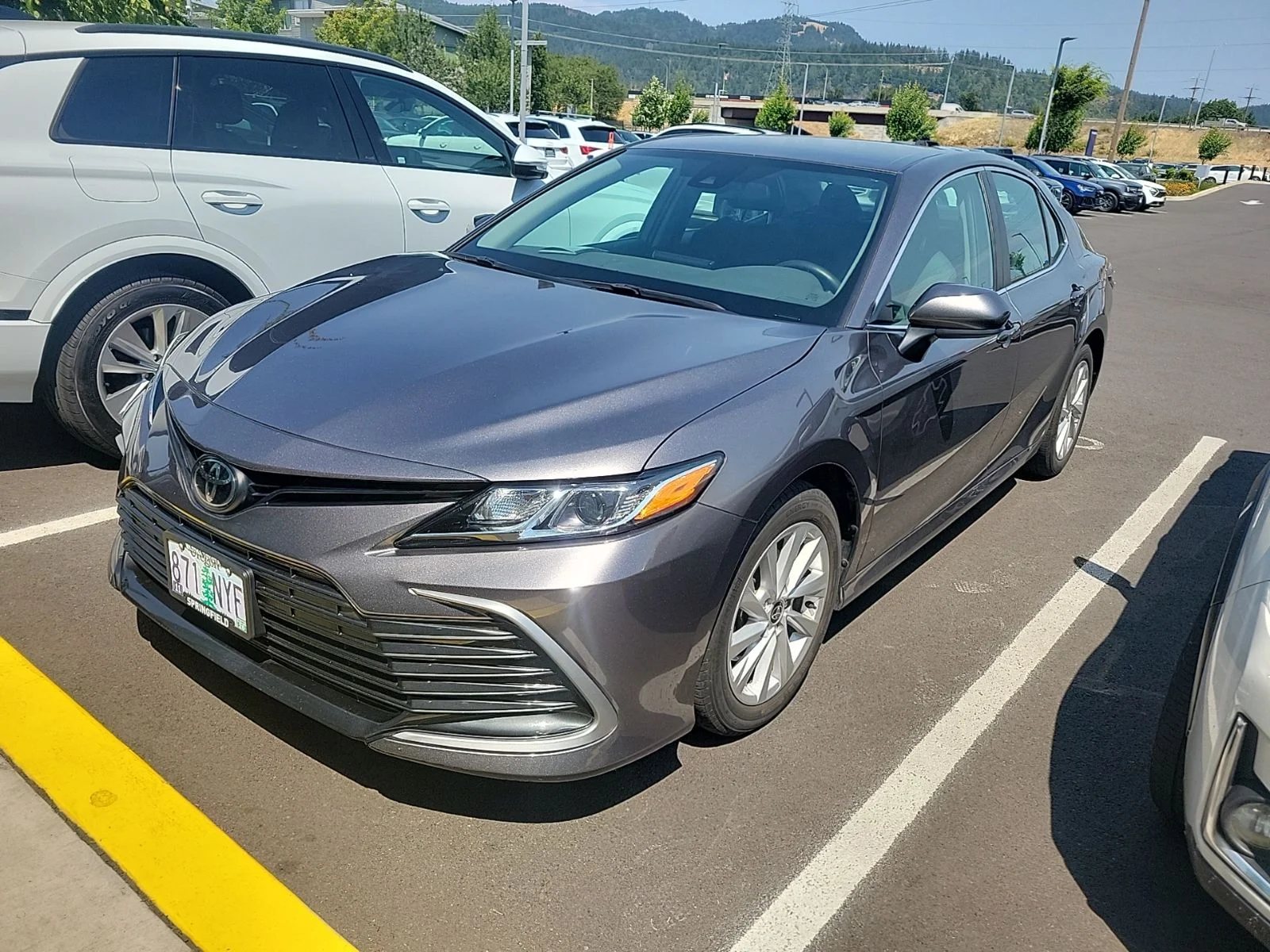 Used 2023 Gray Toyota LE image 1
