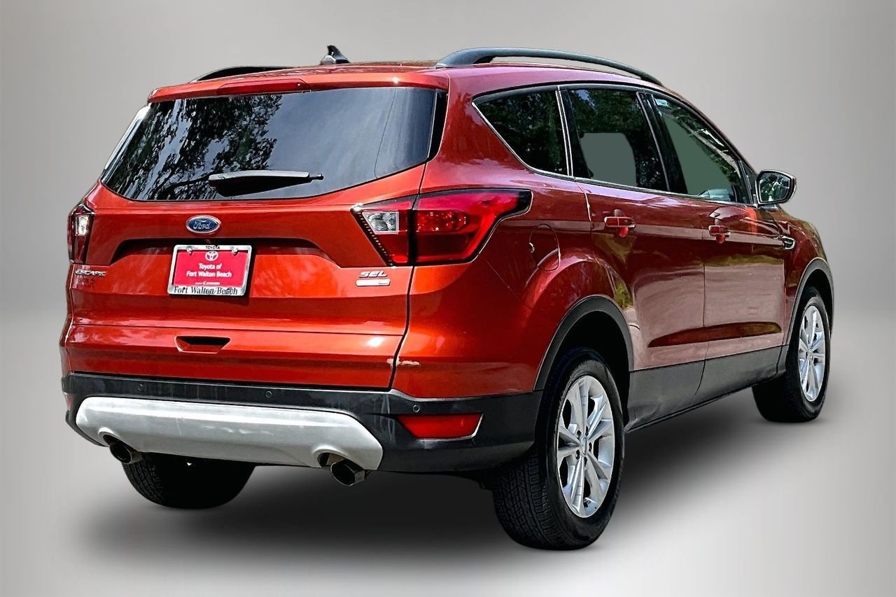 Used 2019 Orange Ford SEL image 5