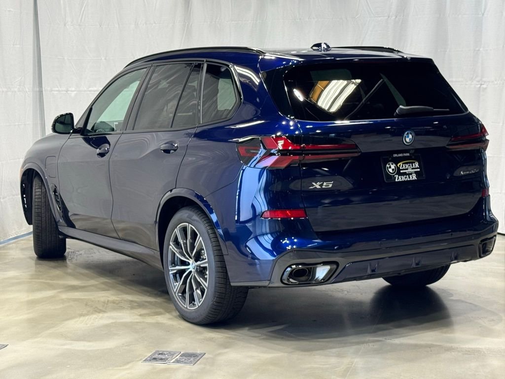 Used 2026 Blue BMW xDrive50e image 4