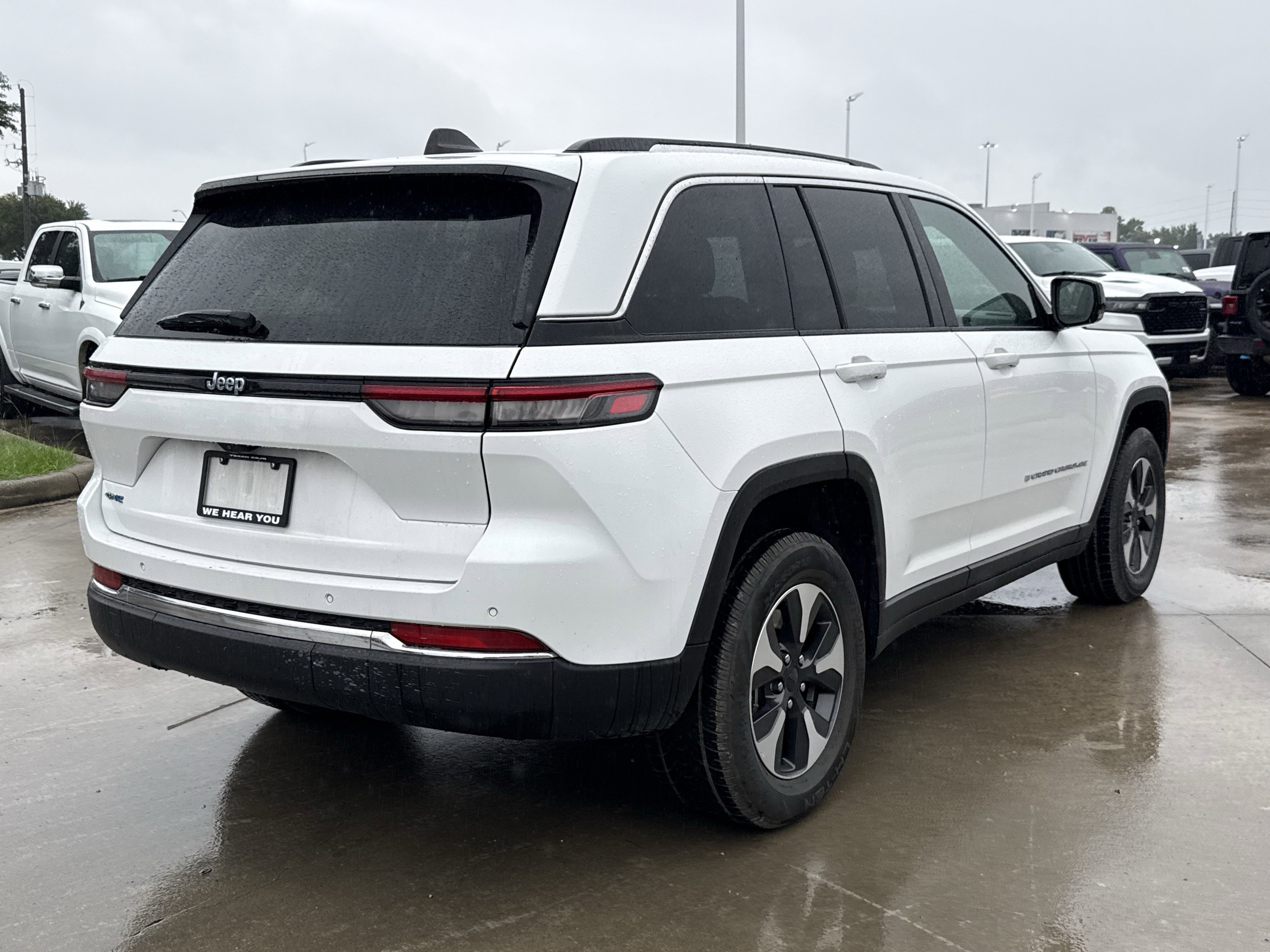 Used 2024 Bright White Clearcoat Jeep 4xe image 4