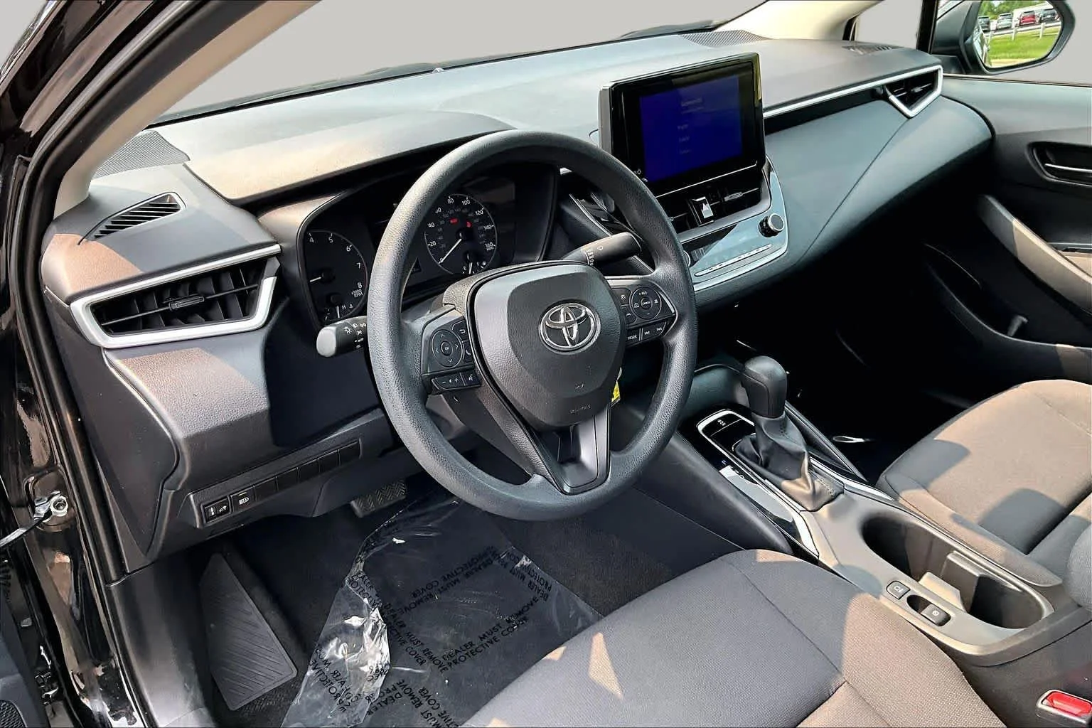 Used 2024 Midnight Black Metallic Toyota LE image 17