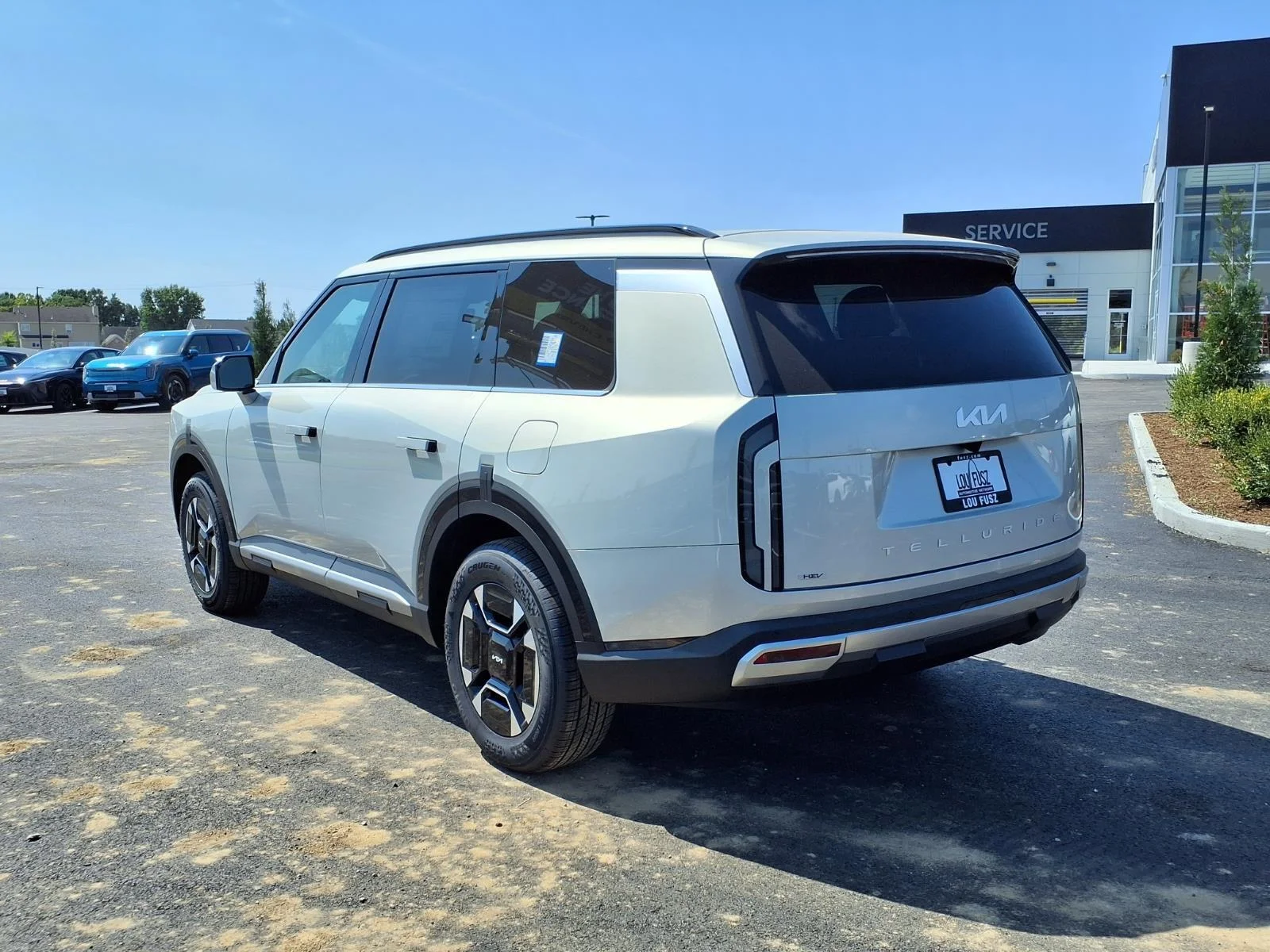 New 2027 Ivory Silver KIA EX AWD image 15