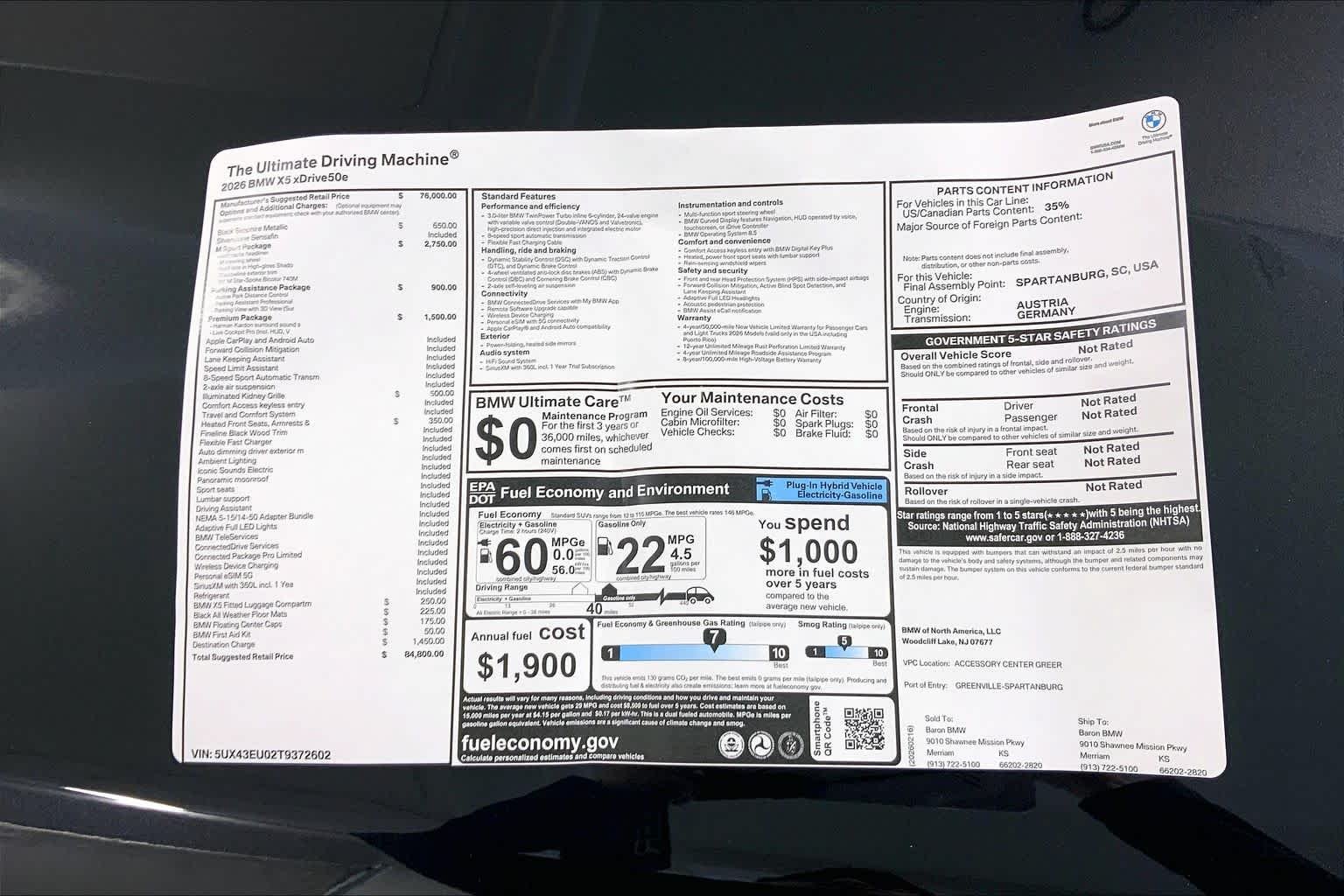 New 2026 Black Sapphire Metallic BMW xDrive50e image 23