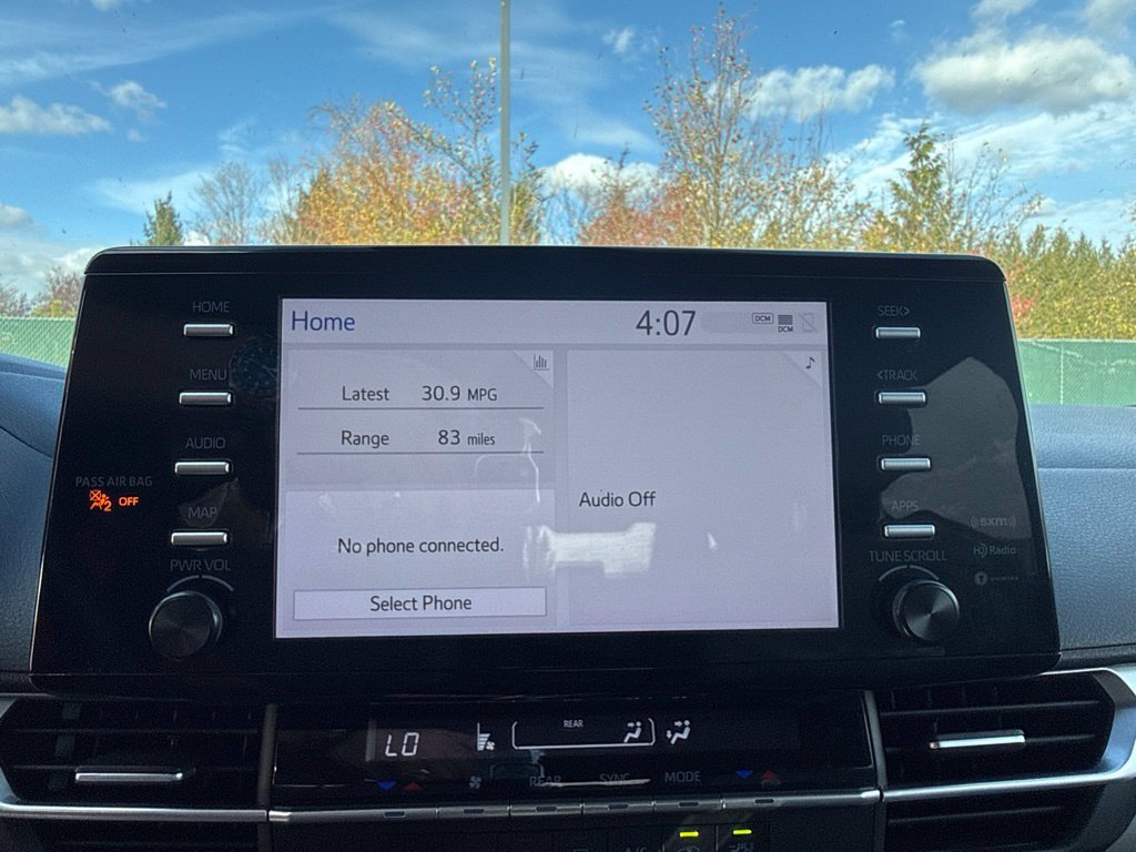 Used 2021 Super White Toyota LE image 14