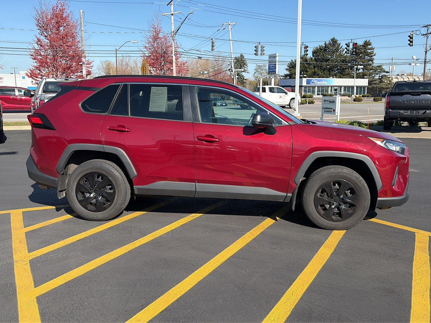 Used 2019 Ruby Flare Pearl Toyota LE image 2