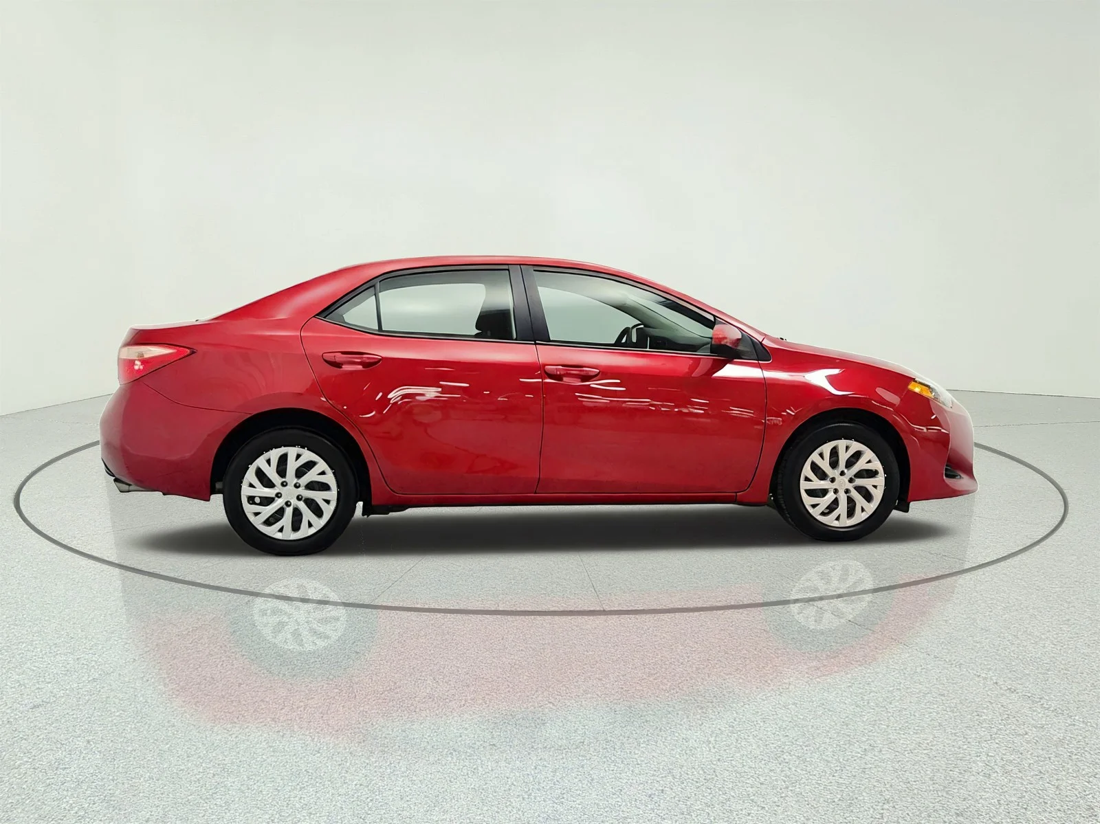 Used 2017 Barcelona Red Metallic Toyota LE image 4