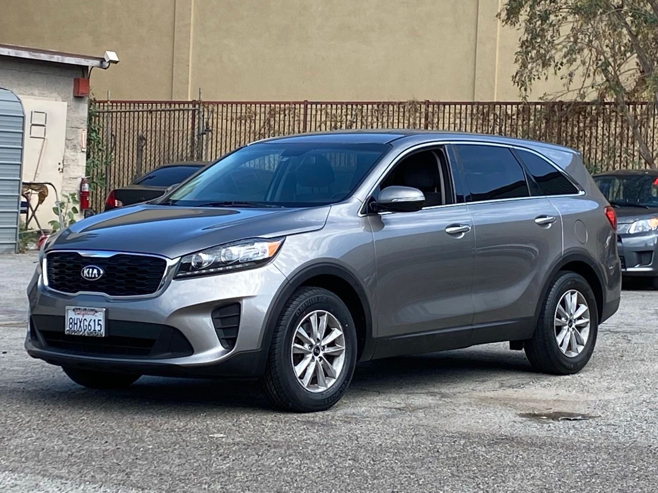 Used 2019 Titanium Silver Kia LX image 1