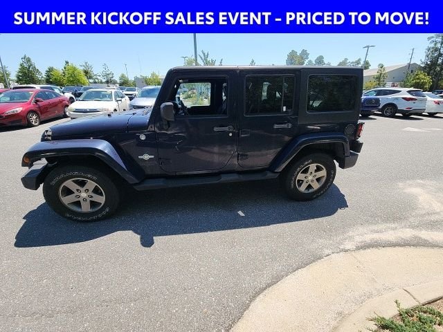 Used 2013 Blue Jeep Unlimited Sport image 8