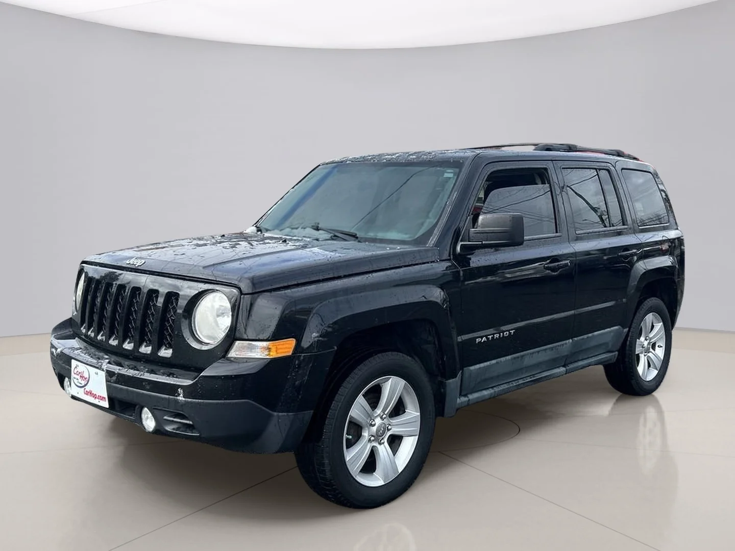 Used 2012 Black Jeep SPORT image 1