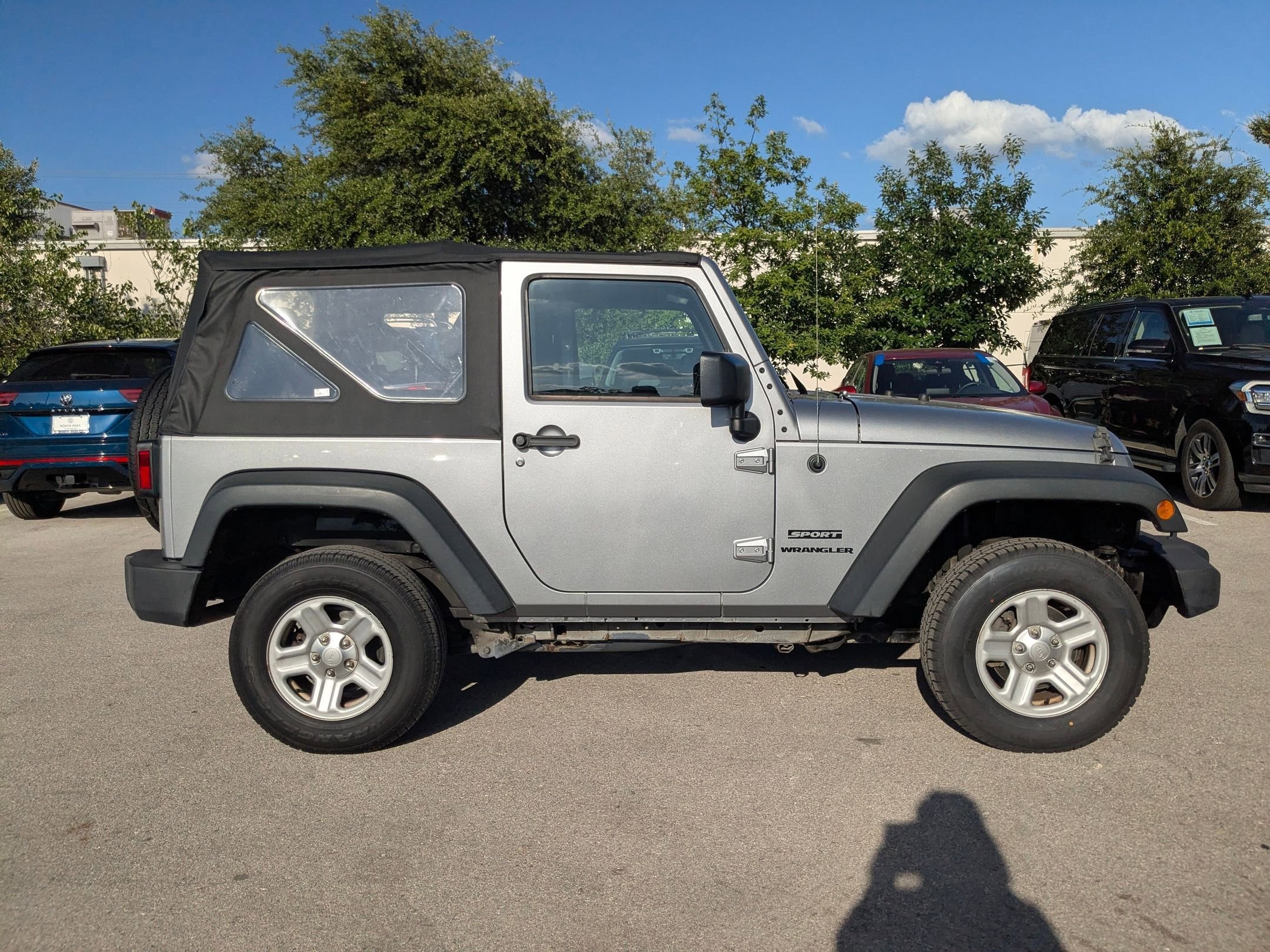 Used 2015 Billet Silver Metallic Clearcoat Jeep Sport image 2