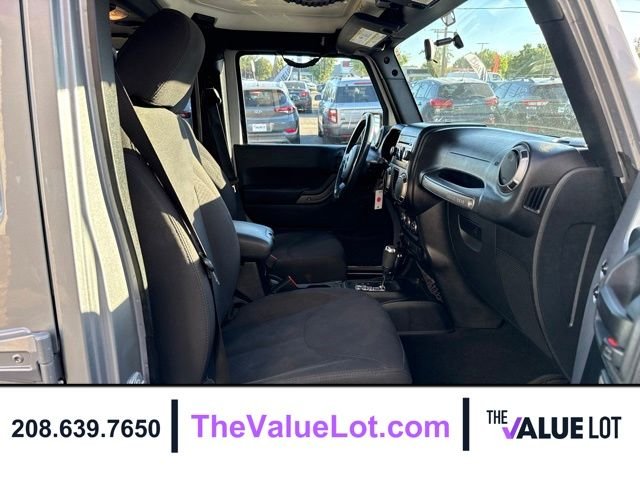 Used 2015 Silver Jeep Unlimited Sport image 13