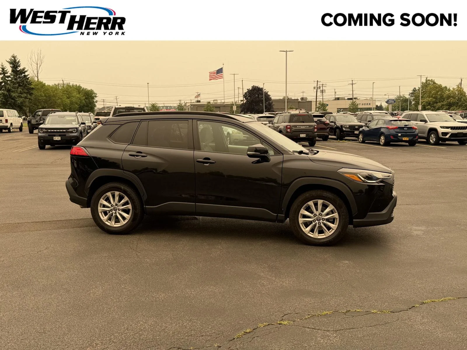 Used 2023 Jet Black Toyota LE image 1