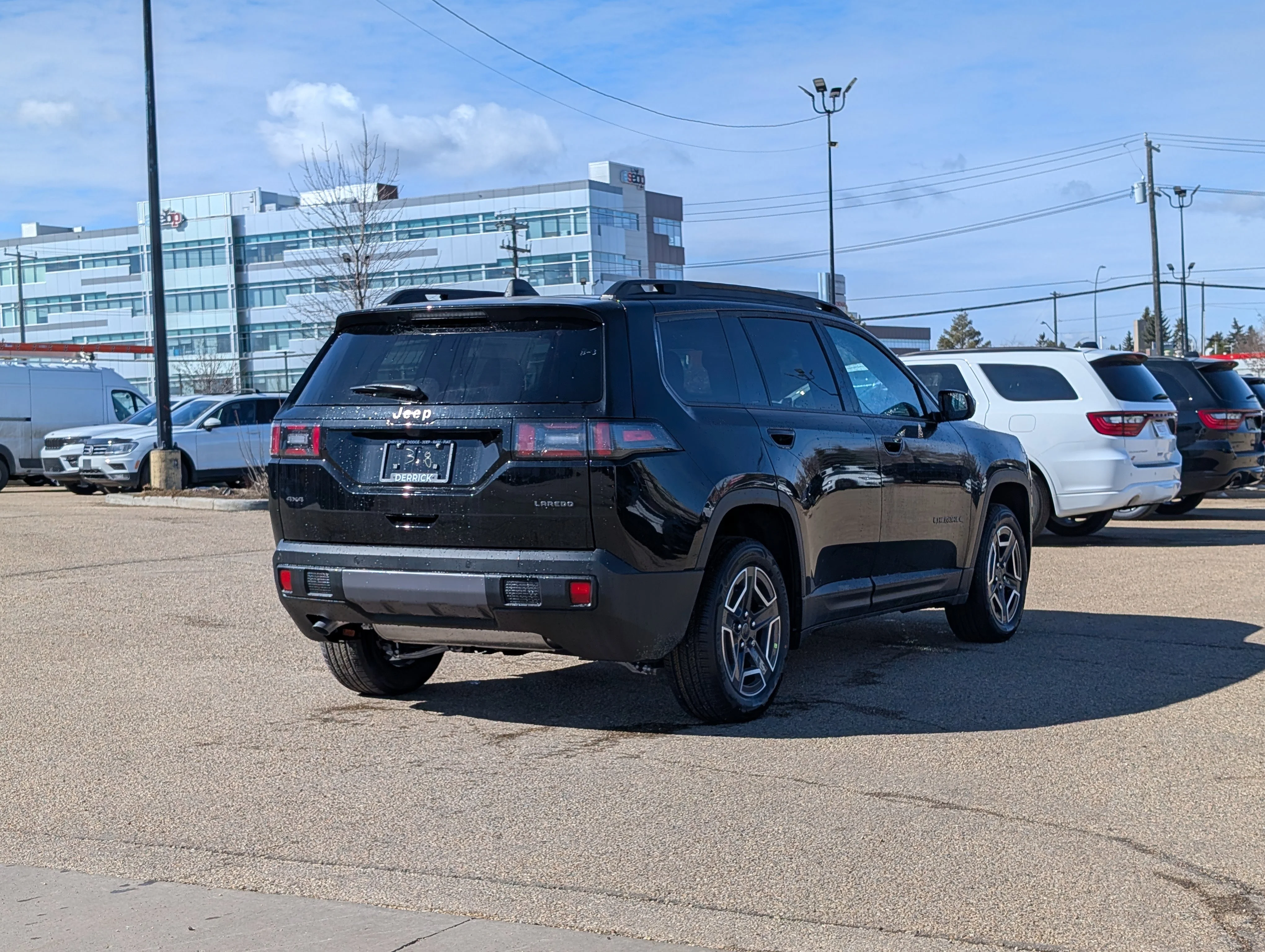 New 2026 Diamond Black Crystal Pearl Jeep Laredo image 7