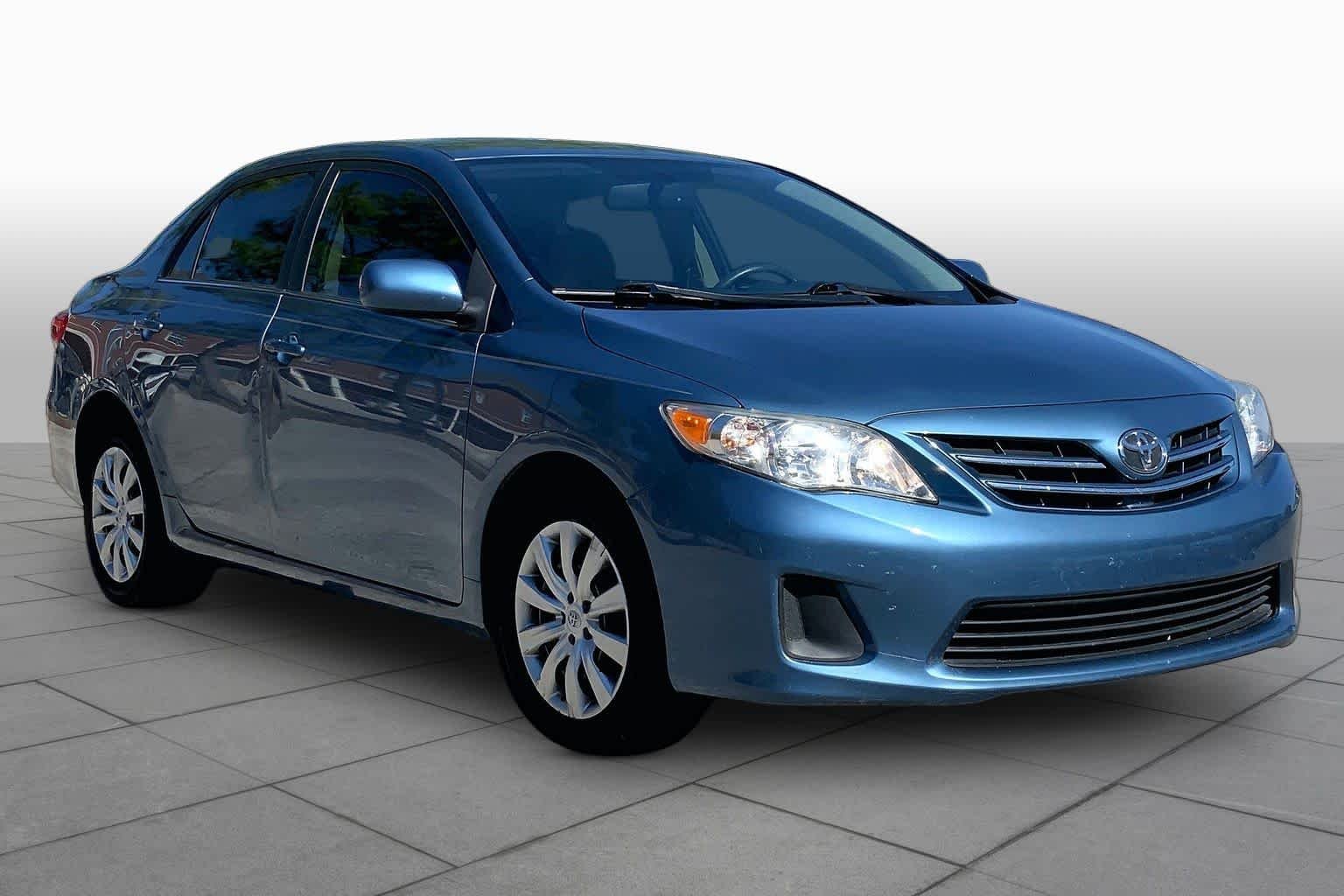 Used 2013 Tropical Sea Metallic Toyota LE image 3
