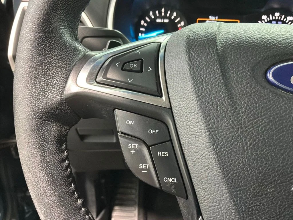 Used 2016 Blue Metallic Ford SEL image 9