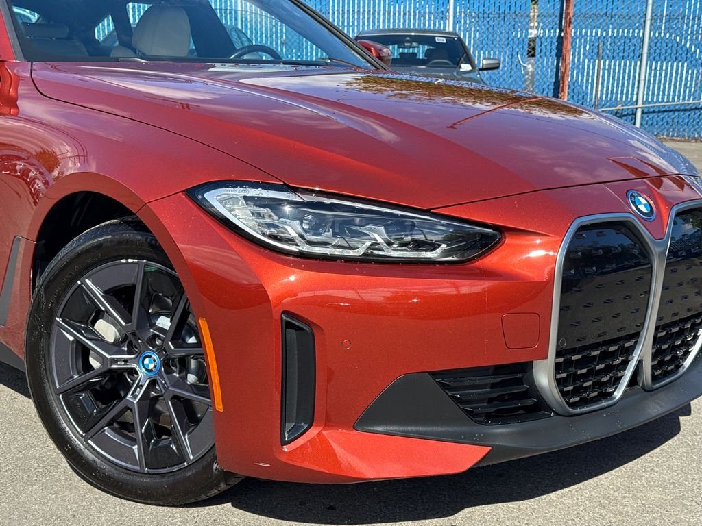 Certified Used 2023 Sunset Orange Metallic BMW eDrive35 image 6