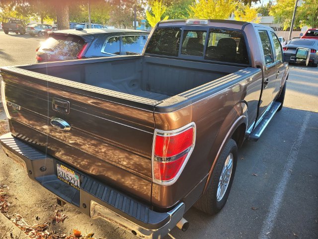 Used 2011 Gold Ford Lariat image 3