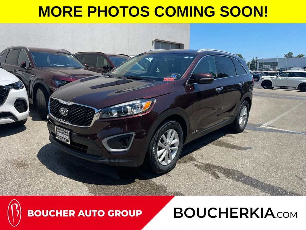 Used 2016 Dark Cherry Kia LX image 1