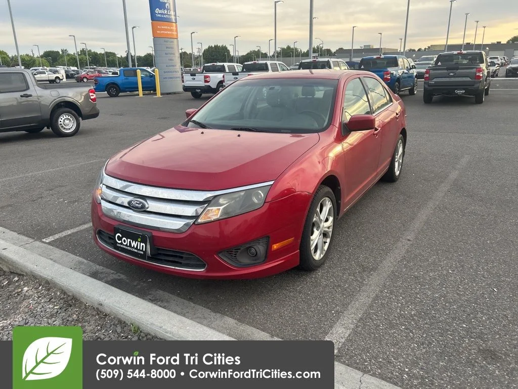 Used 2012 Red Candy Metallic Tinted Clearcoat Ford SE image 4