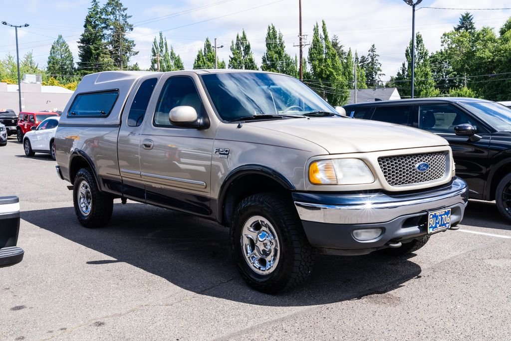 Used 2000 Harvest Gold Clearcoat Metallic Ford Lariat image 1